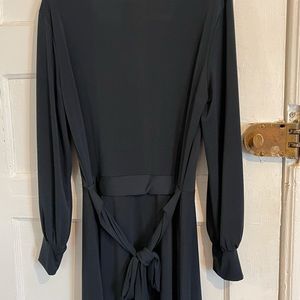 Hunter green midi length dress.